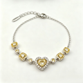 Golden Heart Crystal Chain Bracelet in Polished Silver Finish