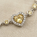Golden Heart Crystal Chain Bracelet in Polished Silver Finish