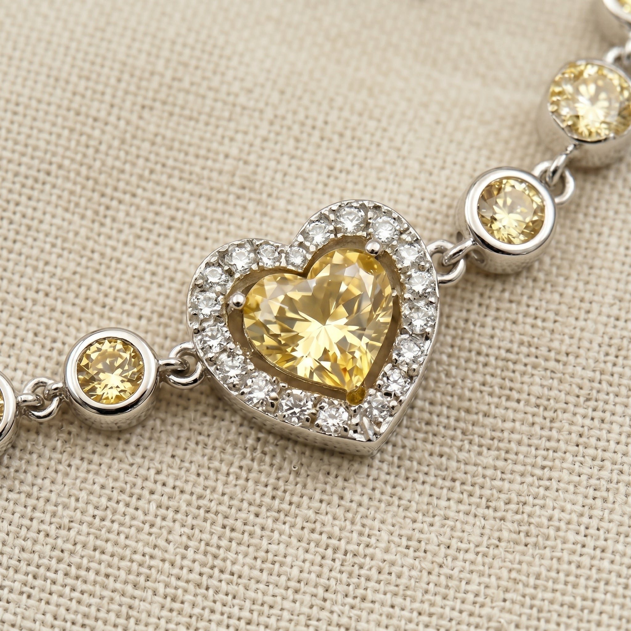 Golden Heart Crystal Chain Bracelet in Polished Silver Finish