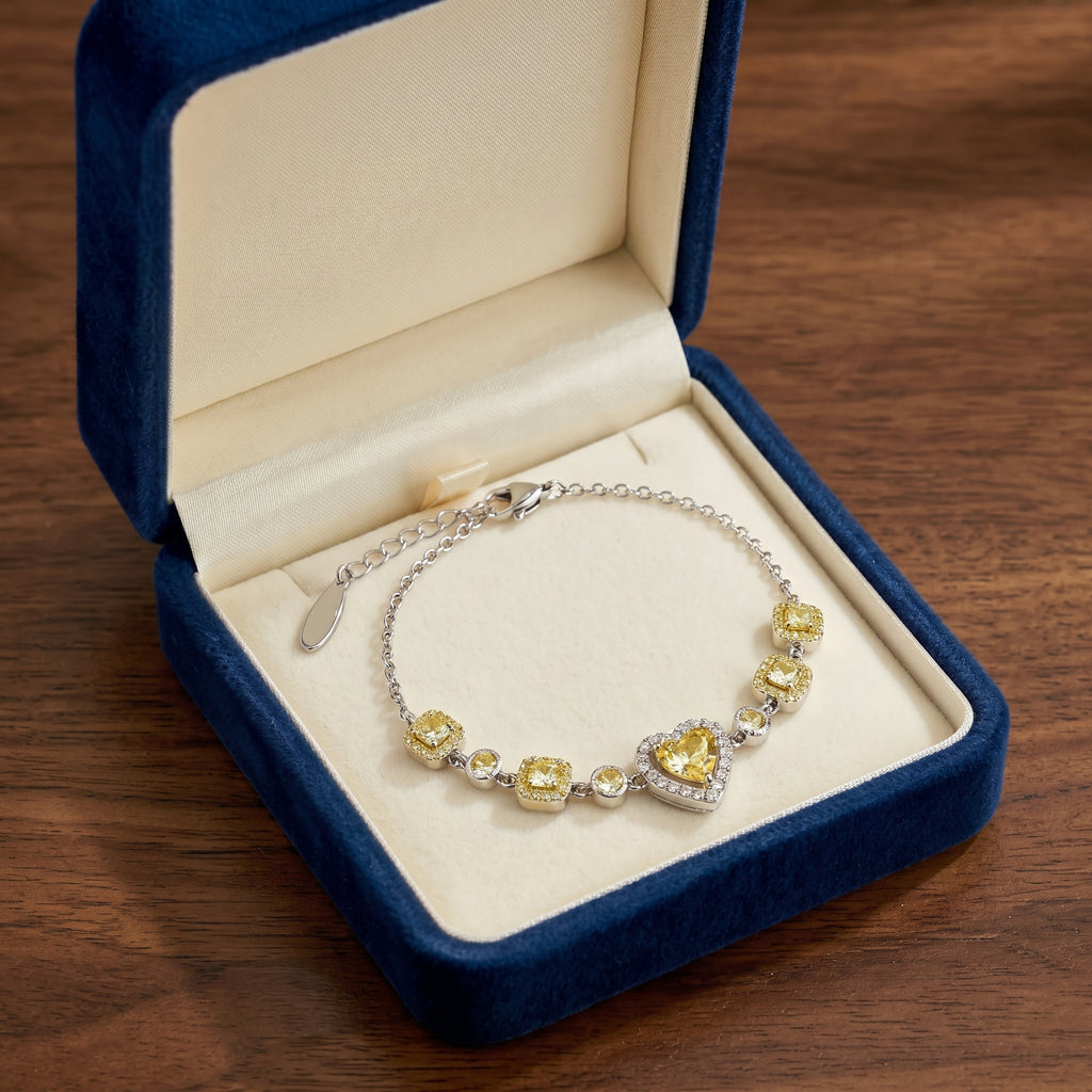 Golden Heart Crystal Chain Bracelet in Polished Silver Finish