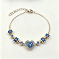 Royal Blue Heart Crystal Chain Bracelet in Gold Finish