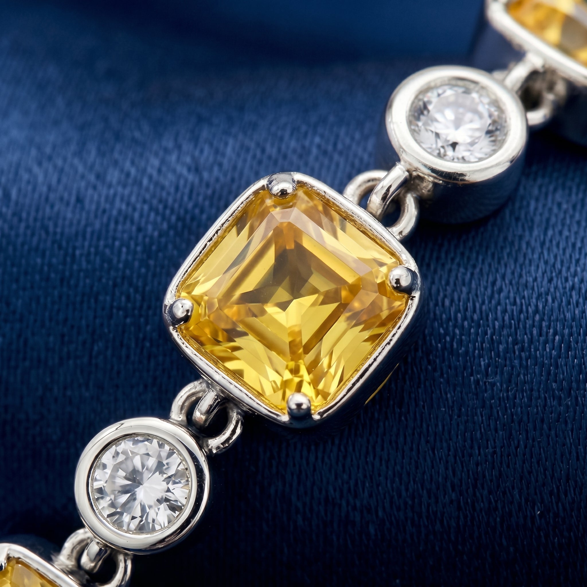 Golden Yellow Crystal Link Bracelet in Polished Silver Finish